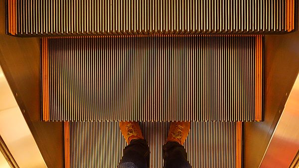 image of an escalator creates sense of movement